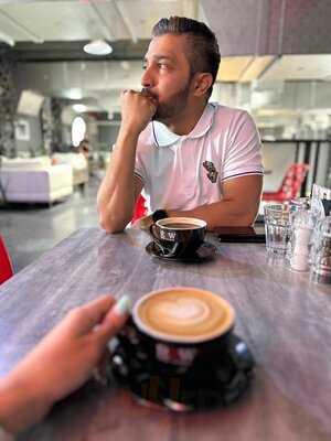 ‪raw Coffee Company‬