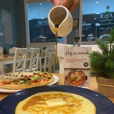 ‪crumby Breakfast & Pizza‬