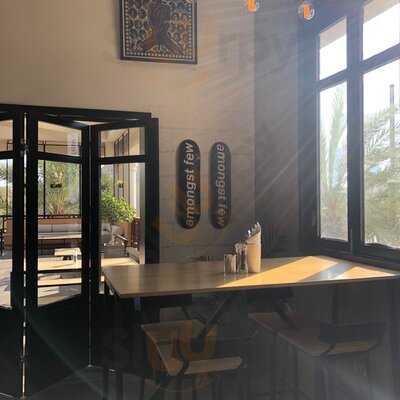 ‪amongst Few Cafe‬
