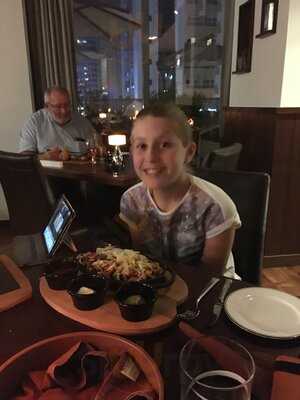 ‪range Bar & Grill‬