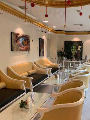 ‪milk & Honey Cafe‬