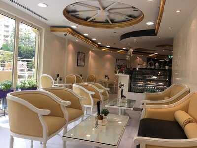 ‪milk & Honey Cafe‬