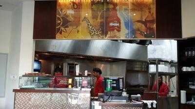 ‪flames Grills & Curry‬