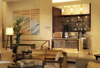 ‪atrium Lobby Lounge - Amwaj Rotana‬