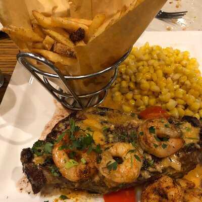 ‪t.g.i.friday's‬