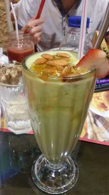 ‪tche Tche Cafe‬