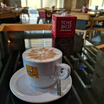 ‪tche Tche Cafe‬