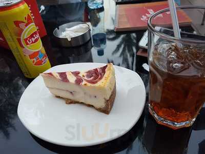 ‪tche Tche Cafe‬