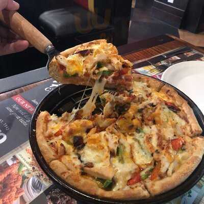 ‪uno Chicago Grill‬