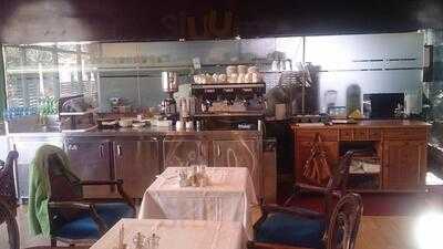 ‪figs & Olives Art & Coffee House‬