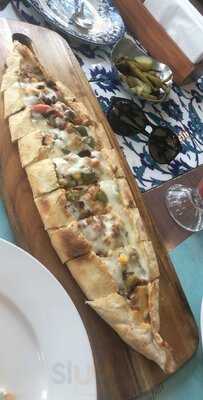 ‪tike The Beach‬