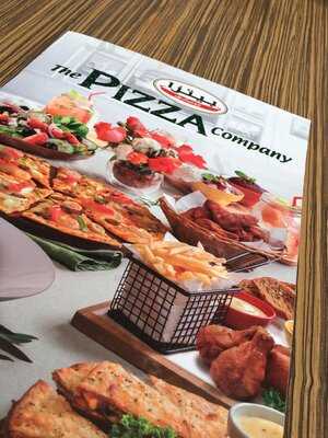‪the Pizza Company‬