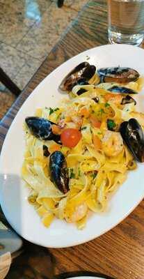 ‪romano's Macaroni Grill‬