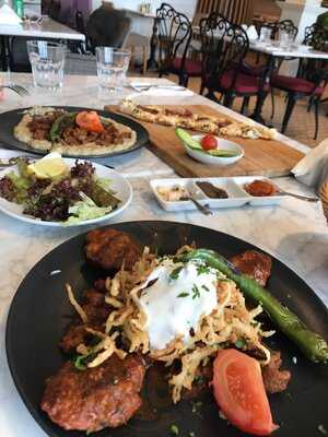 ‪mado Emirates Cafe‬