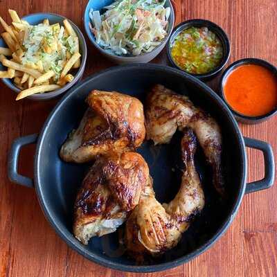 ‪the Roost Rotisserie‬