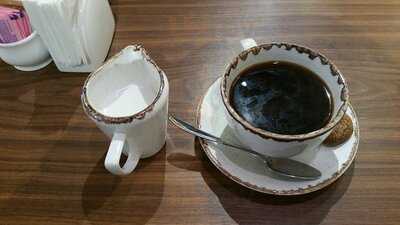 ‪its A Grind Coffee House‬