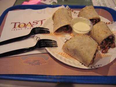 ‪toast Cafe‬