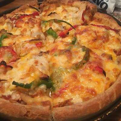 ‪uno Chicago Grill‬