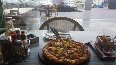 ‪the Pizza Company‬