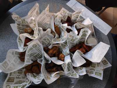 ‪wingstop‬
