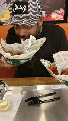 ‪wingstop‬