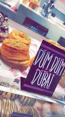 ‪dum Dum Donutterie‬
