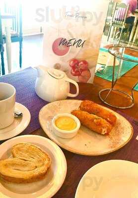 ‪tomato Pizzeria‬