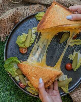 ‪grains & Greens‬