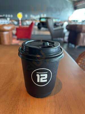 ‪flat 12 Cafe‬