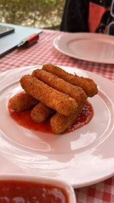 ‪mateos Pizzeria‬