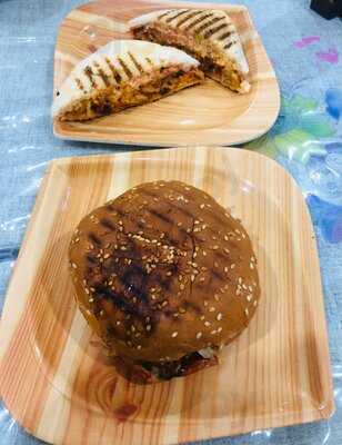 ‪the Scooter Cafe‬