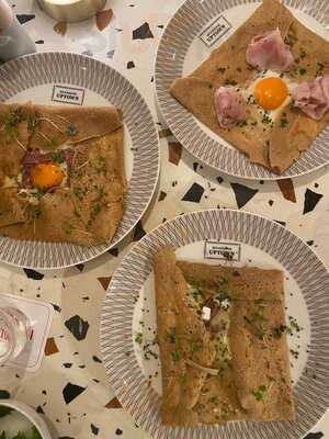 ‪uptown Brasserie‬