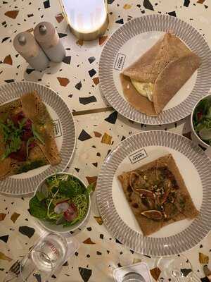 ‪uptown Brasserie‬