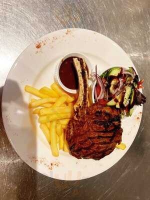 Flaming Peacock House Of Grill