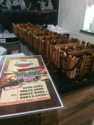 Suprema Pizzas E Calzones