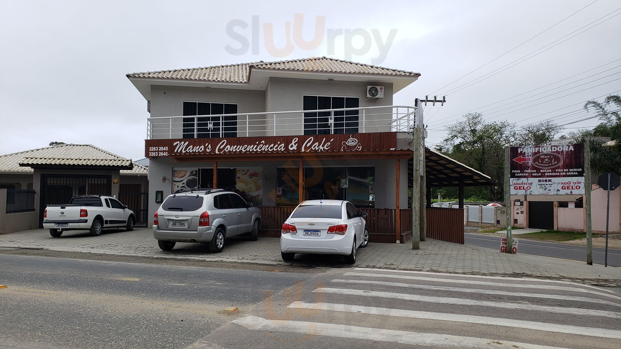 Manos Conveniência E Café