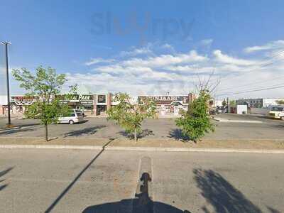 Slumdog Bar And Grill