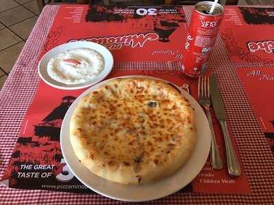 ‪minouche Pizza‬