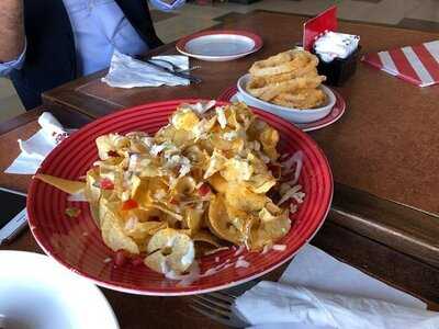 ‪t.g.i Friday's‬