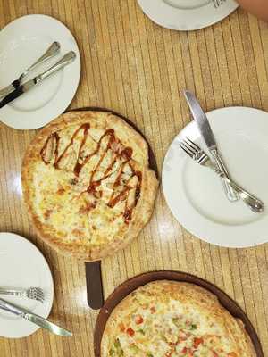 ‪domino's Pizza‬