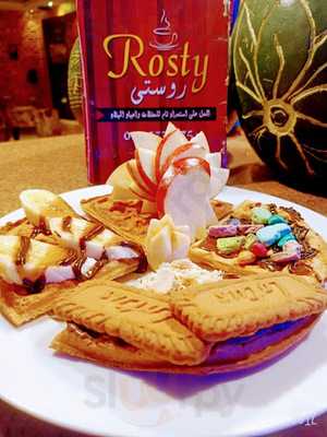 ‪rosty Cafe‬