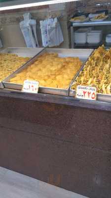 ‪tres Bien Patisserie‬