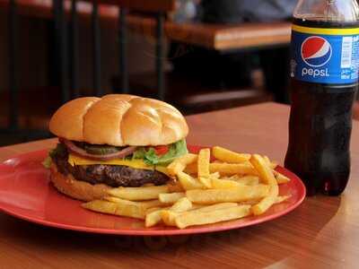 ‪buck's Cairo American Grill‬