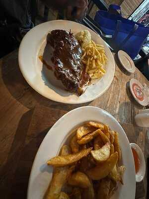 Moo Moos Steakhouse Bar And Grill