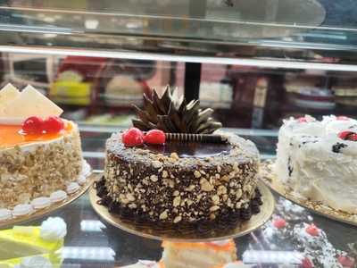 Asha Sweets Centre