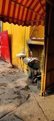 Suraj's Cash 'n' Curry Kitchen