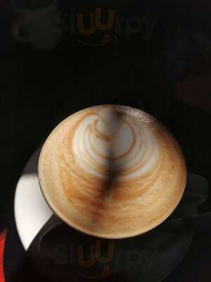 Las Cuatro Puertas Barra De Café