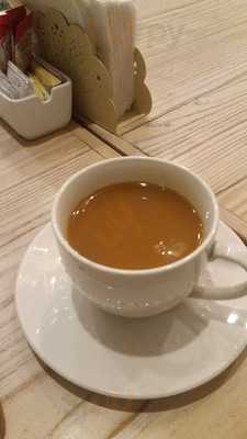 De Los Santos Pasteles Y Cafe