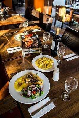 Pisqha. Carnes, Pizza & Café