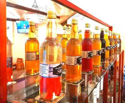 Caliente - Teteria Macerados Y Tapas